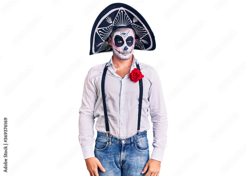 Man wearing day of the dead costume over background skeptic and nervous, frowning upset because of problem. negative person.