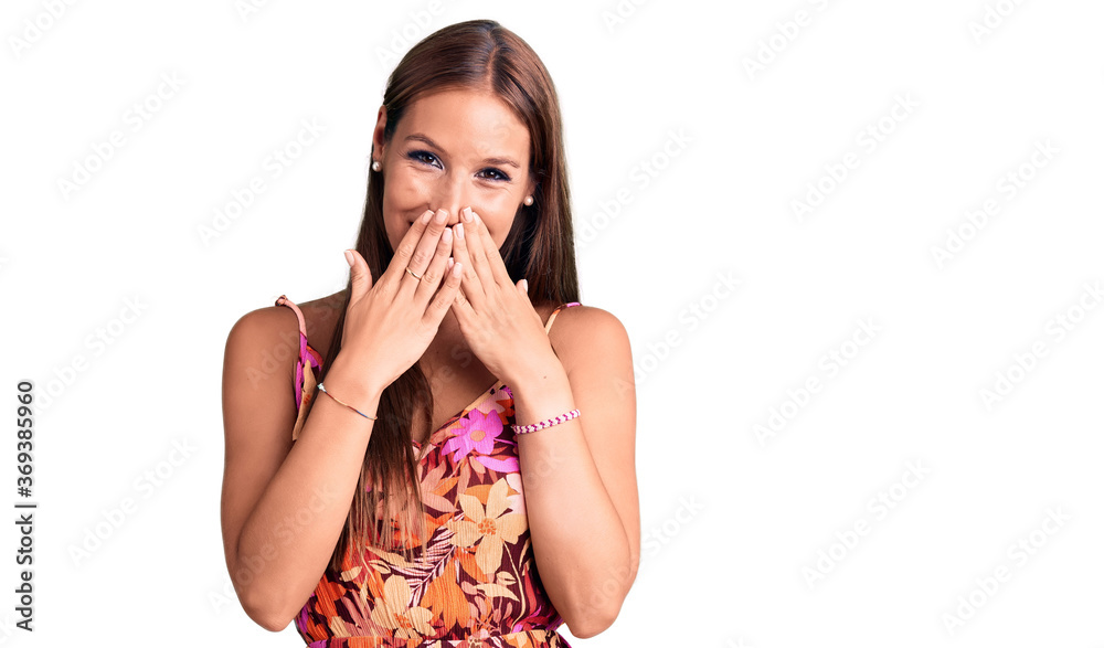 Young beautiful hispanic woman wearing casual clothes laughing and embarrassed giggle covering mouth with hands, gossip and scandal concept Young beautiful hispanic woman wearing casual clothes laughing and embarrassed giggle covering mouth with hands, gossip and scandal concept