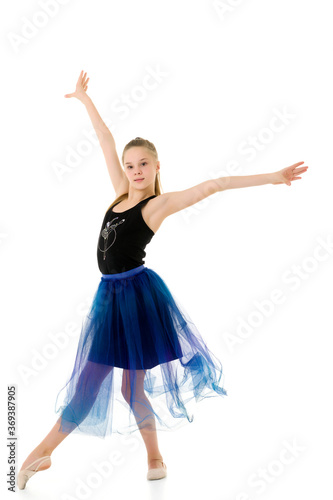 Graceful Girl Gymnast Performing Rhythmic Gymnastics Exercise.