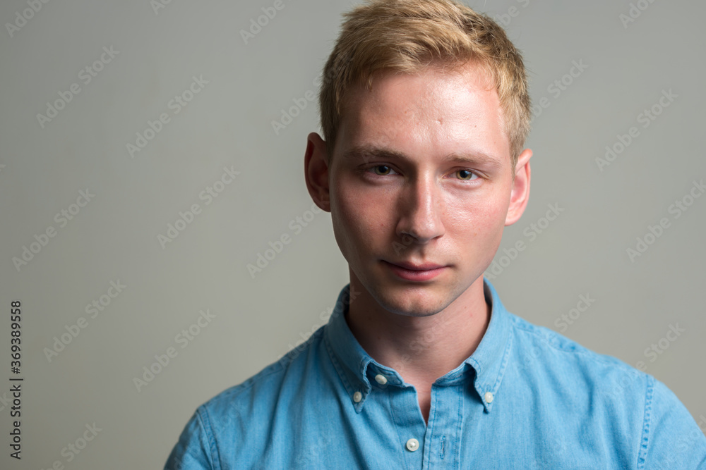 Portrait of young handsome businessman with blond hair Portrait of young handsome businessman with blond hair