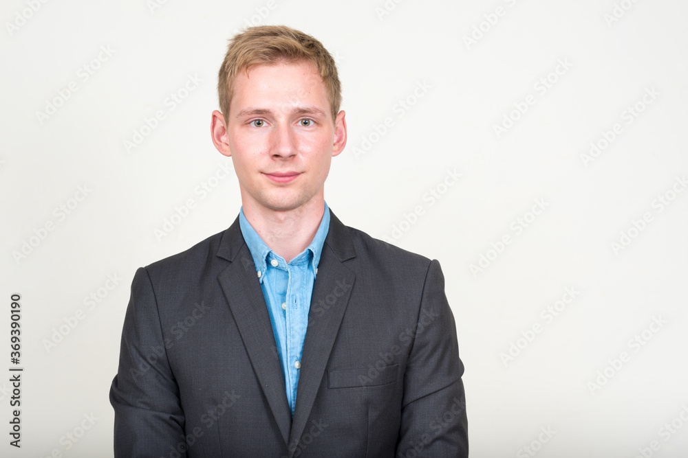 Portrait of young handsome blond businessman in suit Portrait of young handsome blond businessman in suit