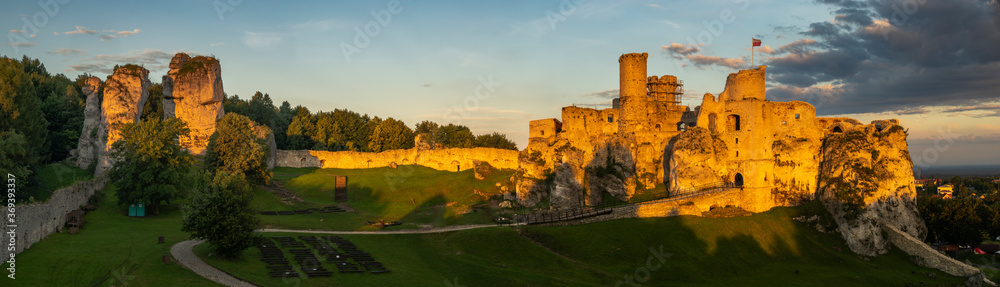 Ogrodzieniec Castle in Poland In the rays of the rising sun The castle is part of the system of strongholds known as the Eagles' Nests