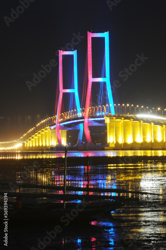 Night light, Suramadu bridge in Indonesia connects Java Island and Madura Island in Surabaya, East Java, Indonesia