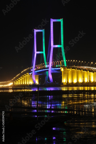 Night light, Suramadu bridge in Indonesia connects Java Island and Madura Island in Surabaya, East Java, Indonesia