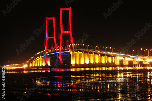 Night light, Suramadu bridge in Indonesia connects Java Island and Madura Island in Surabaya, East Java, Indonesia