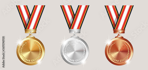 Set of medals gold silver and bronze with ribbon Premium Vector