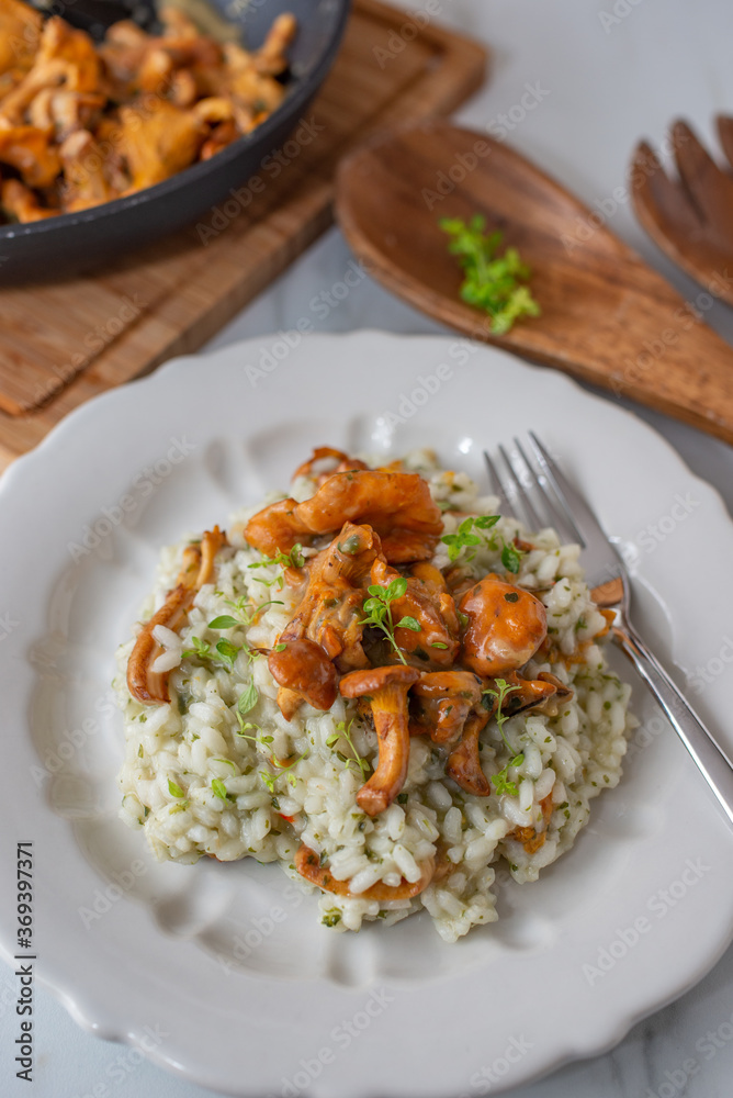 home made Risotto with chanterelle mushrooms and herbs home made Risotto with chanterelle mushrooms and herbs