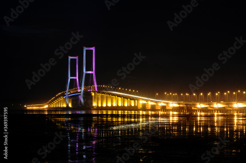Night light, Suramadu bridge in Indonesia connects Java Island and Madura Island in Surabaya, East Java, Indonesia