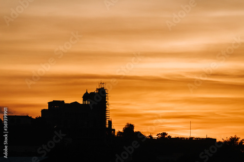 Silhouette of Palace against the sky during the sunset