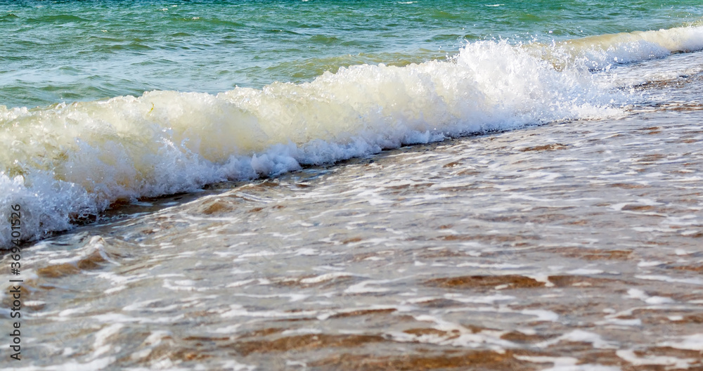 ocean sea waves on sandy beach ocean sea waves on sandy beach