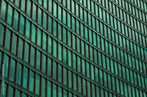 abstract image of green window panes pattern on a modern building - backgrounds