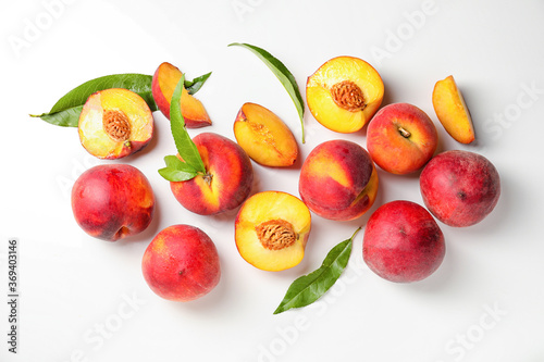 Fototapeta Naklejka Na Ścianę i Meble -  Sweet ripe peaches on white background