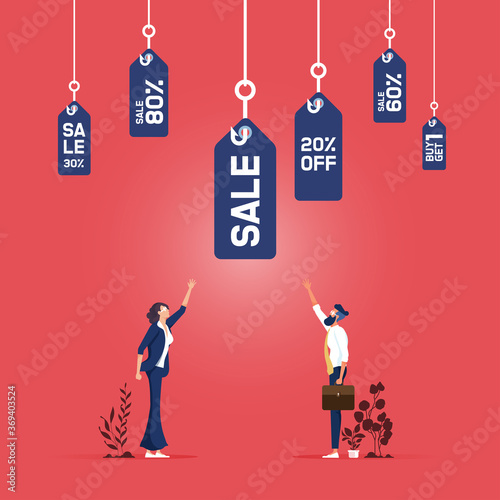 group of fishing hooks with a sale price tag bait attached to the lure as a shopping symbol for promoting attracting and tempting buying clients to be tempted by bargain prices