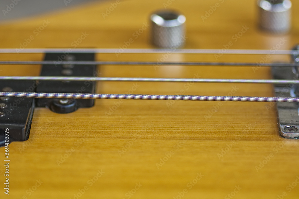 acoustic guitar close up.Bass guitar strings acoustic guitar close up.Bass guitar strings