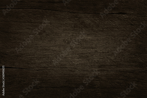 Dark brown wooden wall background, texture of bark wood with old natural pattern for design art work, top view of grain timber.