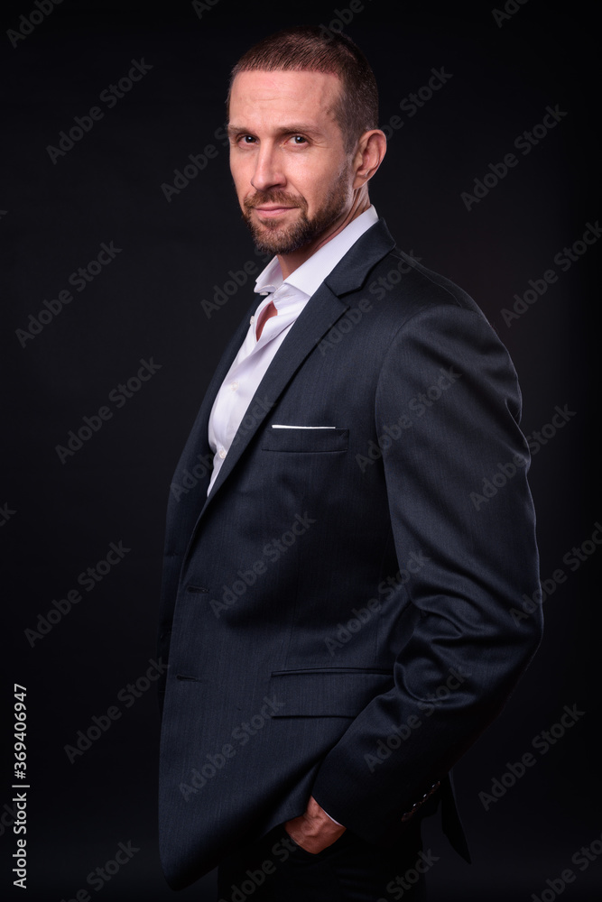 Portrait of handsome bearded businessman in suit Portrait of handsome bearded businessman in suit