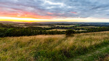 sunset over the field from a hill top in south united kingdom