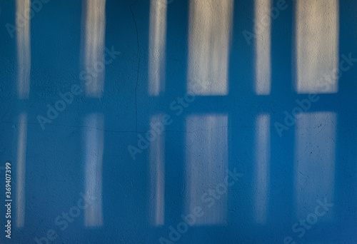 Blue frames of window shadow.