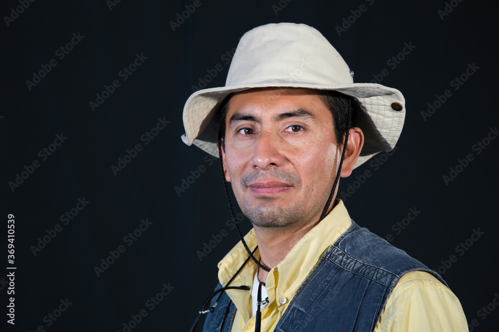 A portrait of a fisherman isolated against black background A portrait of a fisherman isolated against black background