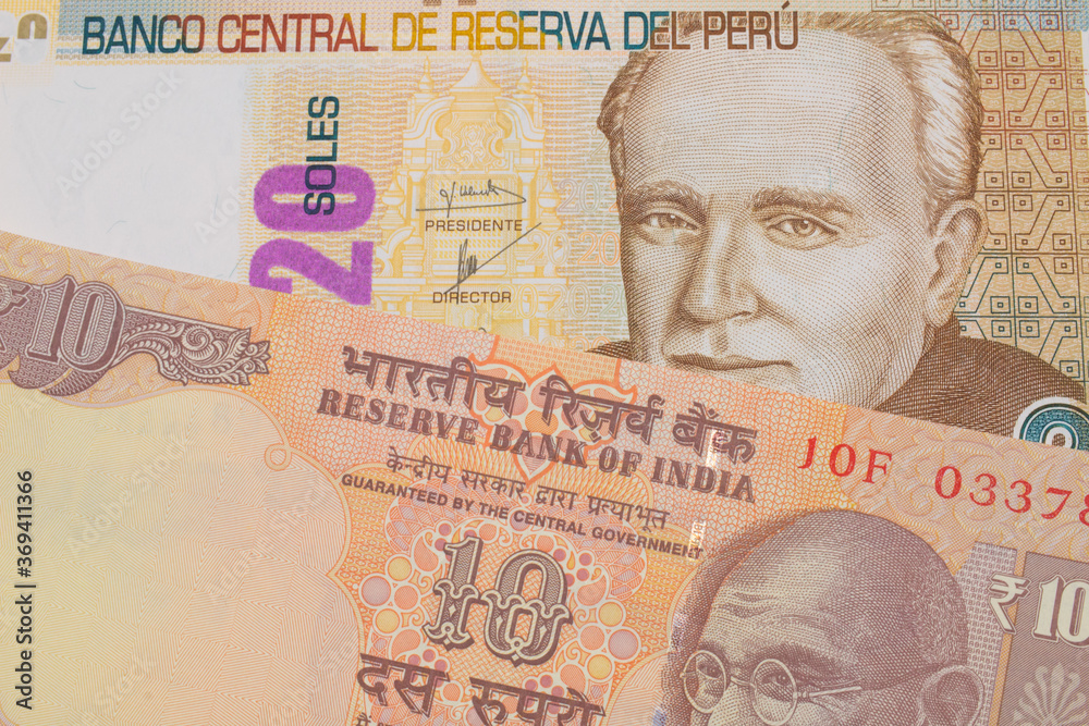 custom made wallpaper toronto digitalA macro image of a orange ten rupee bill from India paired up with a beige, twenty sol bill from Peru.  Shot close up in macro.