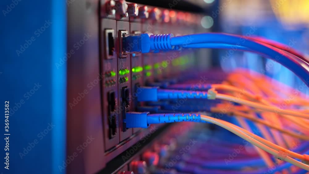 Fiber Optic cables connected to an optic ports