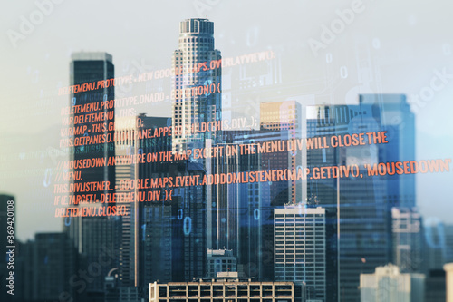 Double exposure of abstract creative programming illustration on Los Angeles office buildings background, big data and blockchain concept