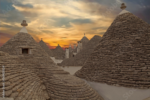 The roofs of trulli at Alberobello at the sunset, Apulia, Italy