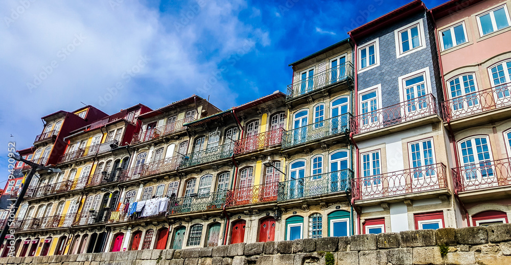 Bright colourful houses at Ribeira embankment (Cais da Ribeira). Porto, Portugal