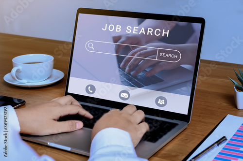 Job search concept, find your career, Man using laptop with job search at online website on screen.