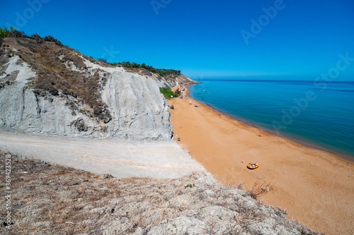 beautiful red beaches and clay hills called Sciolle on the Ionian Sea, protected marine area of Capo Rizzuto. Crotone, Calabria, Italy. photo