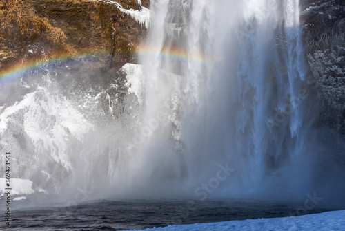 Picturesque winter landscape view of Skogafoss waterfall in the Iceland.