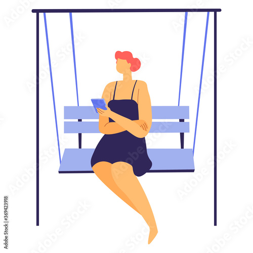 Woman reading info in smartphone or chatting sitting on bench