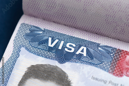 Close up of text VISA on USA visa stamp in passport