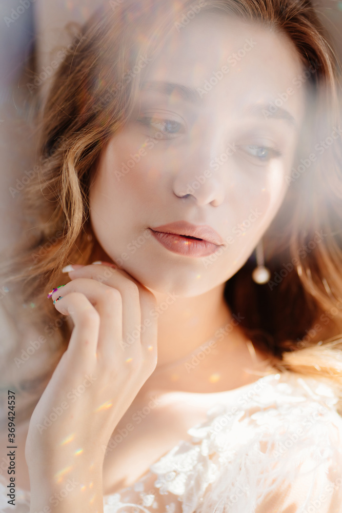 close-up sun glare. beautiful woman with long hair close-up sun glare. beautiful woman with long hair