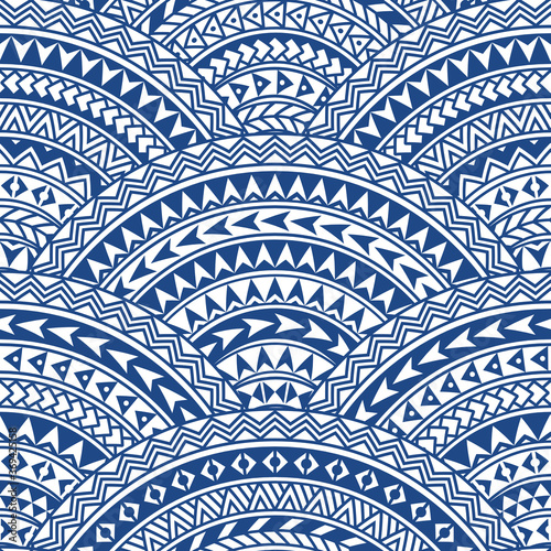 Seamless pattern with geometrical wavy fish scale layout. Maori geometrical ornaments, blue and white stripes. Wallpaper, wrapping, chintz print, Batik paint. 29 pattern brushes in the brush palette