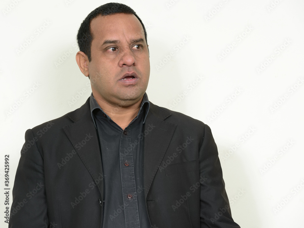 Portrait of overweight Indian businessman in suit Portrait of overweight Indian businessman in suit