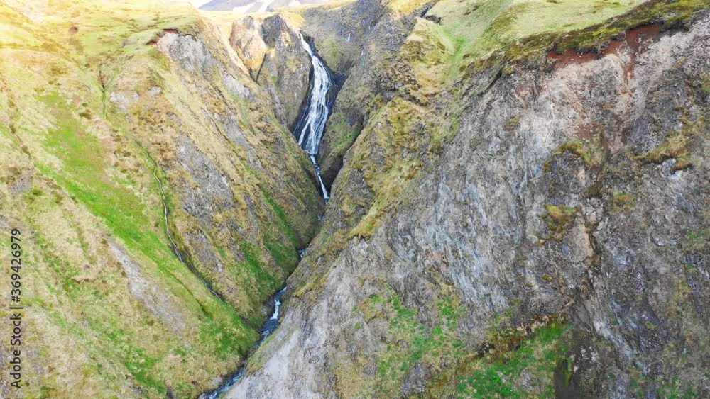 Aerial view of a waterfall in Alaska, United States. Aerial view of a waterfall in Alaska, United States.