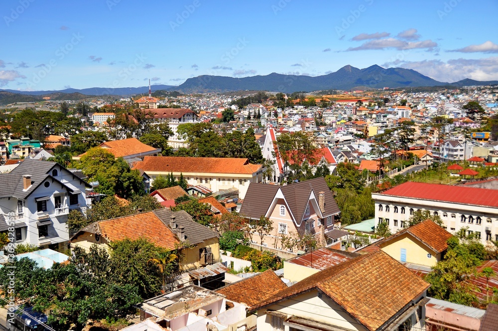 part of the city of Dalat built by the French in a European style in the territory of southern vietnam and photographed on a clear sunny day under a blue sky