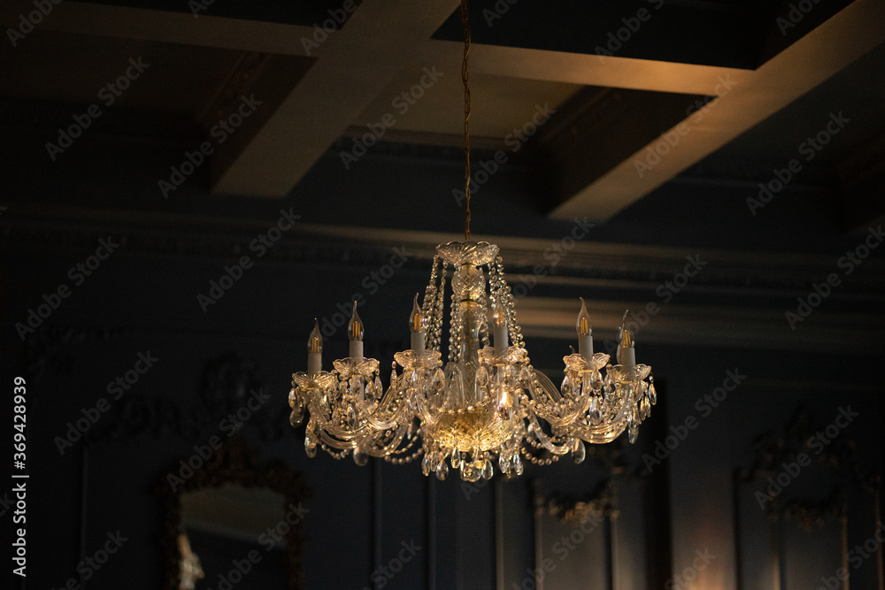 chandelier in the temple. large antique crystal chandelier under the ceiling