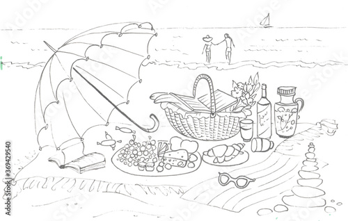 picnic basket umbrella on the beach