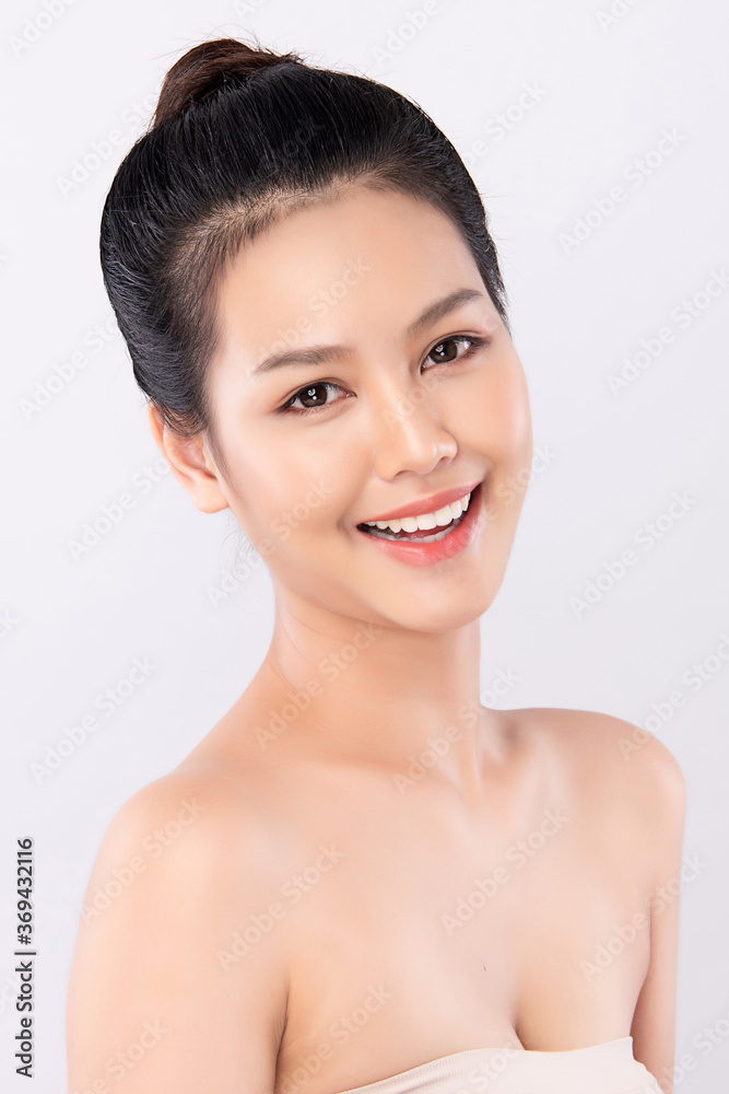 Beautiful Young asian Woman with Clean Fresh Skin on white background, Face care, Facial treatment, Cosmetology, beauty and spa, Asian women portrait Beautiful Young asian Woman with Clean Fresh Skin on white background, Face care, Facial treatment, Cosmetology, beauty and spa, Asian women portrait
