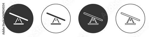 Black Seesaw icon isolated on white background. Teeter equal board. Playground symbol. Circle button. Vector.