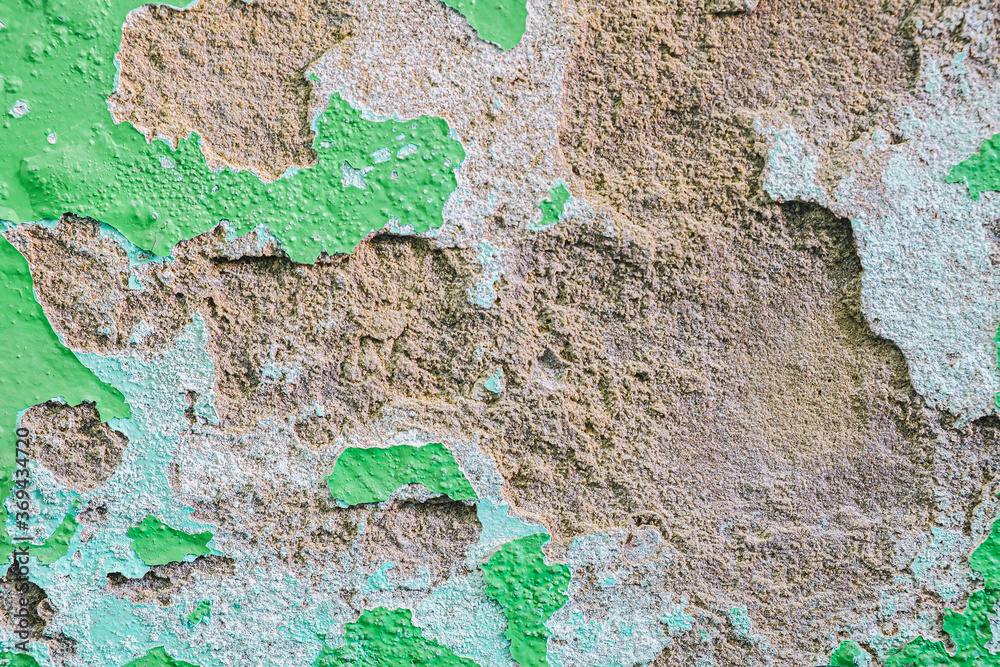 Old dirty painted wall. Several layers of peeling paint. background texture. Horizontal
