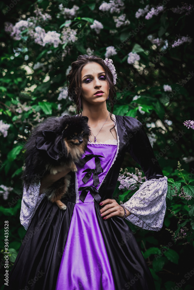 Fototapeta premium Lady in black and purple baroque dress
