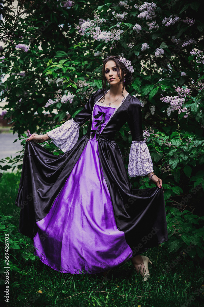Lady in black and purple baroque dress Lady in black and purple baroque dress
