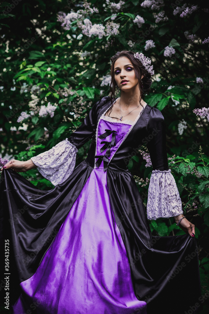 Lady in black and purple baroque dress