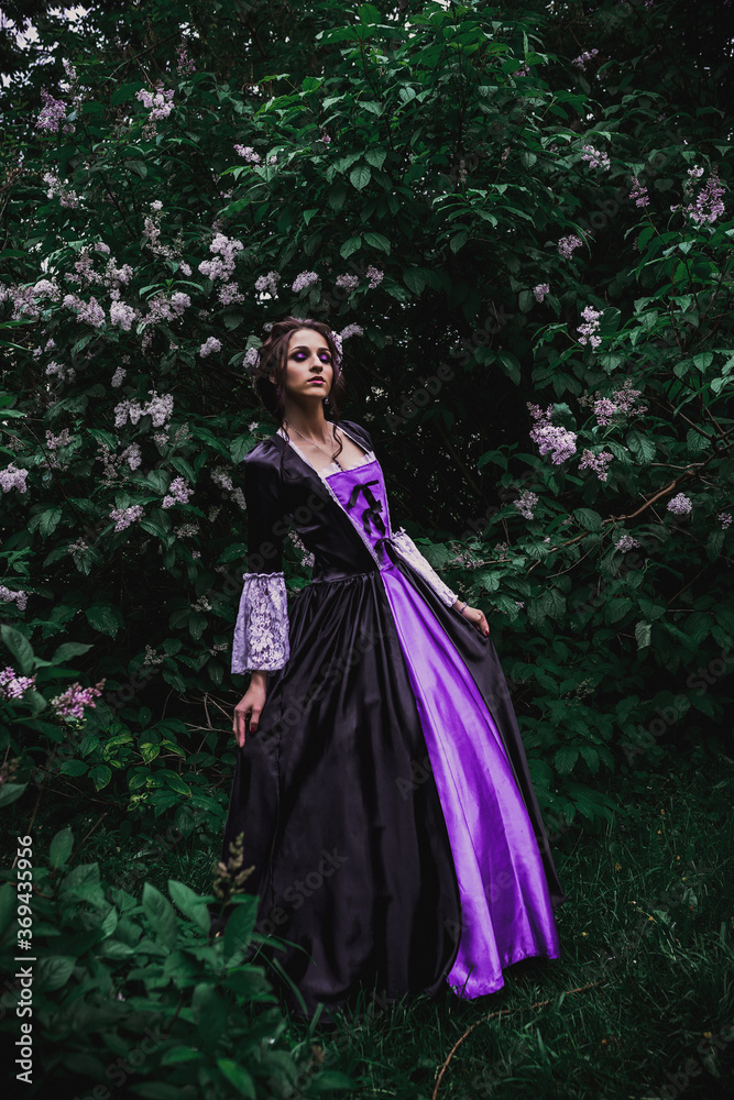 Lady in black and purple baroque dress