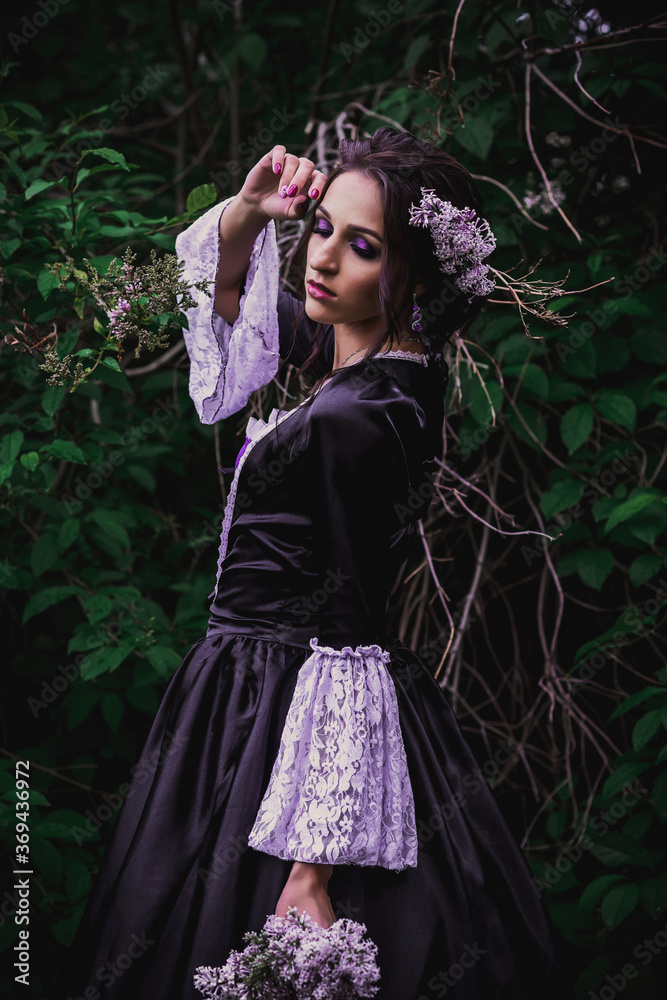 Lady in black and purple baroque dress Lady in black and purple baroque dress