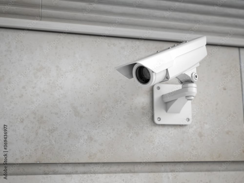 Modern white CCTV camera on a wall. Security monitoring concept. 3d rendering