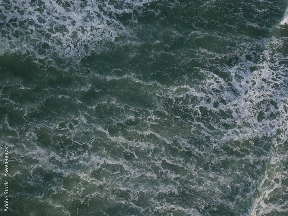 Aerial photo of a small surf break off the coast of New Zealand. Aerial photo of a small surf break off the coast of New Zealand.
